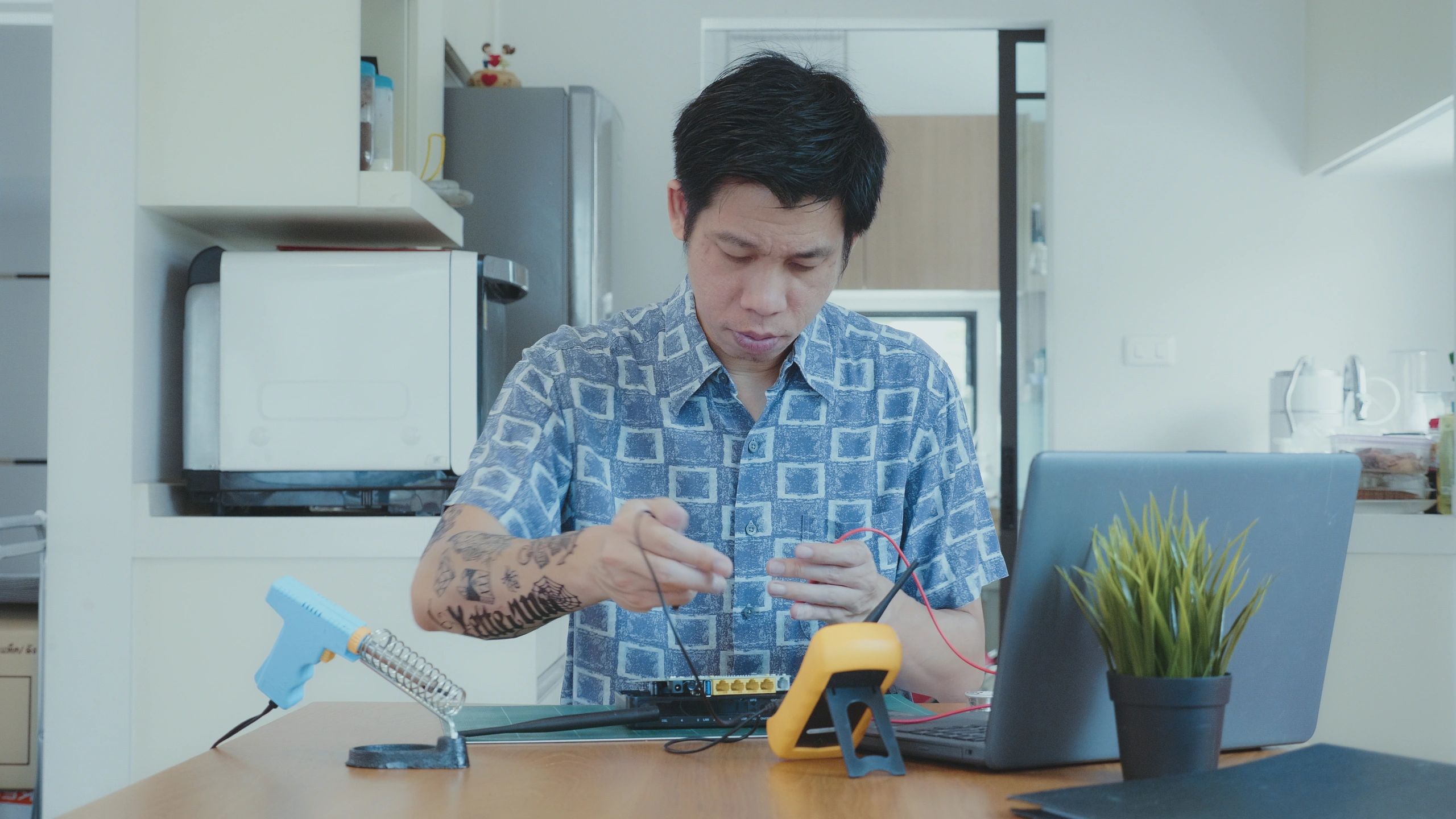 Home appliance service technician at work