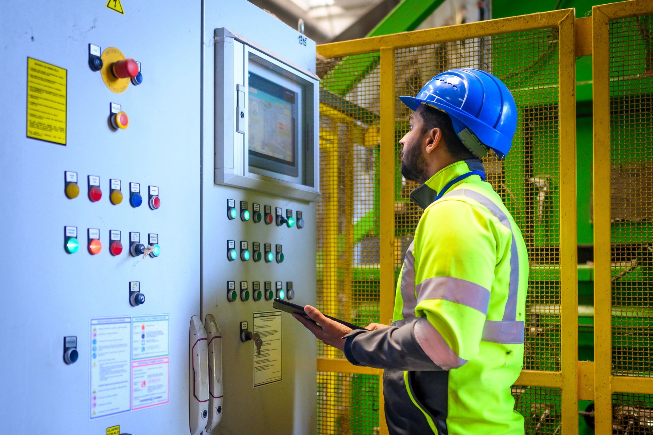 Service technician inspecting equipment