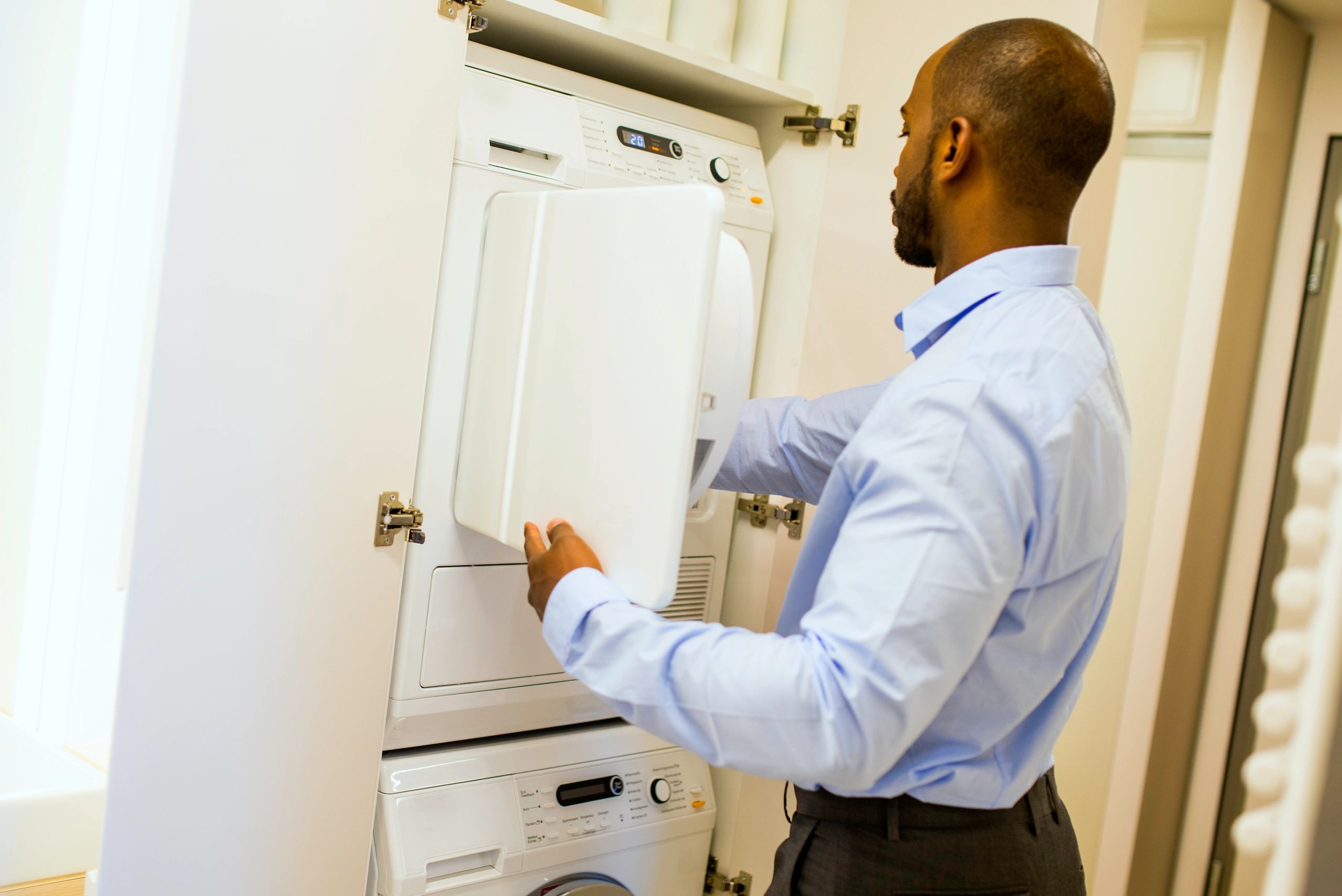 Appliance service scene with laundry equipment